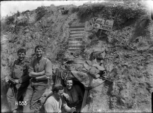 New Zealand soldiers with the Cannibals Paradise sign in World War I France